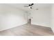 Light bedroom featuring a contemporary ceiling fan and neutral flooring at 1909 Dover Ct, Oldsmar, FL 34677