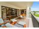 Balcony with outdoor seating offers room to relax and enjoy the views at 19531 Gulf Blvd # 306, Indian Shores, FL 33785