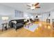 Inviting living area with hardwood floors, modern decor, and comfortable seating at 19531 Gulf Blvd # 306, Indian Shores, FL 33785