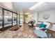 Inviting lobby featuring comfortable seating, tile flooring, and easy entry access at 19531 Gulf Blvd # 306, Indian Shores, FL 33785