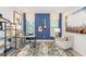 Home office featuring a desk, shelving, guitars, and a comfortable chair at 1959 Longliner Loop, Wesley Chapel, FL 33543