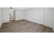 Bedroom boasts wood-look flooring, closet and bright natural light at 2333 Feather Sound Dr # A107, Clearwater, FL 33762