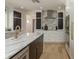 Bright kitchen with marble countertops, stainless steel appliances, and a large center island at 2395 Campbell Rd, Clearwater, FL 33765