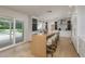 Spacious kitchen features marble counters, stainless steel appliances, and access to the outdoor area at 2395 Campbell Rd, Clearwater, FL 33765