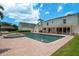 Enjoy the backyard's pool, spa and covered patio of this beautiful home at 2395 Campbell Rd, Clearwater, FL 33765
