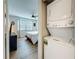 Convenient in-unit stackable washer and dryer beside the main bedroom at 2400 Winding Creek Blvd # 14-201, Clearwater, FL 33761