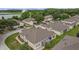 Aerial view of a neighborhood of single Gathering homes with well-maintained lawns and mature trees at 2616 Tottenham Dr, New Port Richey, FL 34655