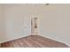 Spacious bedroom with wood-look floors and neutral walls at 2616 Tottenham Dr, New Port Richey, FL 34655
