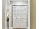 Hall closet with white bi-fold doors at 2960 59Th S St # 303, Gulfport, FL 33707