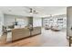 Large living room with comfortable seating and stylish décor, featuring a ceiling fan at 2960 59Th S St # 303, Gulfport, FL 33707