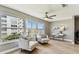 Bright living area with lots of natural light, and a ceiling fan at 2960 59Th S St # 303, Gulfport, FL 33707