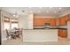Spacious kitchen featuring granite countertops, stainless steel appliances, and a breakfast bar with seating at 30753 Pumpkin Ridge Dr, Wesley Chapel, FL 33543