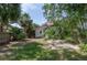 A serene backyard offers a private outdoor retreat with mature landscaping and space to relax at 317 19Th S Ave, St Petersburg, FL 33705