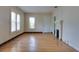 Open living room with hardwood floors, a fireplace, and natural light at 317 19Th S Ave, St Petersburg, FL 33705
