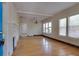 Spacious living room with hardwood floors, fireplace, and large windows at 317 19Th S Ave, St Petersburg, FL 33705