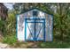 View of the charming shed in the backyard, offering great extra storage at 317 19Th S Ave, St Petersburg, FL 33705