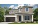 A charming two-story home featuring a front-entry two-car garage, a welcoming front porch, and tidy landscaping at 33306 Castaway Loop, Wesley Chapel, FL 33543