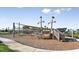 Community playground featuring a ship-themed play structure with slides and climbing areas at 33306 Castaway Loop, Wesley Chapel, FL 33543