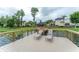 Lakeside Preserve waterfront dock with lounge chairs and beautiful community views at 3415 Heards Ferry Dr, Tampa, FL 33618