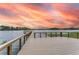 Lakeside Preserve waterfront deck with stunning sunset views at 3415 Heards Ferry Dr, Tampa, FL 33618