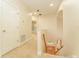 Upstairs hallway features carpet, doors, natural light, and an open view of the staircase at 3415 Heards Ferry Dr, Tampa, FL 33618