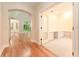 Open floor plan with hardwood floors leading to the front office at 3415 Heards Ferry Dr, Tampa, FL 33618