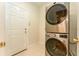 Convenient laundry area with stacked washer and dryer at 3415 Heards Ferry Dr, Tampa, FL 33618