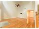 Bright living room featuring hardwood floors, ceiling fan and a soaring ceiling at 3415 Heards Ferry Dr, Tampa, FL 33618