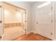Inviting front office with built-in cabinets and shelving, and hardwood floors at 3415 Heards Ferry Dr, Tampa, FL 33618