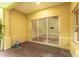 Covered patio with brick flooring and sliding glass doors at 3415 Heards Ferry Dr, Tampa, FL 33618