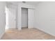 Bedroom featuring closet and entry doors at 34234 Polacca Ln, Wesley Chapel, FL 33543