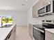 Well-equipped kitchen with modern countertops and appliances at 34234 Polacca Ln, Wesley Chapel, FL 33543