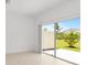 Bright room with sliding glass doors to the backyard at 34234 Polacca Ln, Wesley Chapel, FL 33543