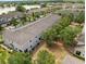 Aerial view of the residential area with mature trees and beautiful lake views at 3901 Silverlake Way, Wesley Chapel, FL 33544