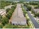 Aerial view showcases residential community with mature trees and convenient street parking at 3901 Silverlake Way, Wesley Chapel, FL 33544