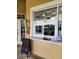 Community Cafe with a large window, menu board, and drinks at 3901 Silverlake Way, Wesley Chapel, FL 33544