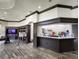 Community center with reading area, TV, and counter for snacks at 3901 Silverlake Way, Wesley Chapel, FL 33544