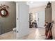 Inviting foyer with tile floors, neutral paint, and stylish decor at 3901 Silverlake Way, Wesley Chapel, FL 33544