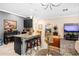 Modern kitchen area with granite countertops, stainless steel appliances, and breakfast bar at 3901 Silverlake Way, Wesley Chapel, FL 33544