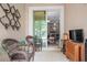 Relaxing screened in porch with comfortable seating, offering outdoor living space at 3901 Silverlake Way, Wesley Chapel, FL 33544