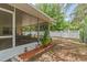 Spacious backyard featuring a screened patio and a well maintained privacy fence at 39721 Meadowood Loop, Zephyrhills, FL 33542