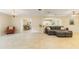 Open-concept living area connecting the dining space and kitchen, offering a spacious and inviting atmosphere at 39721 Meadowood Loop, Zephyrhills, FL 33542
