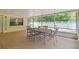 Large, screened-in patio perfect for outdoor entertaining and relaxation at 39721 Meadowood Loop, Zephyrhills, FL 33542