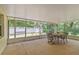 Large, screened-in patio perfect for outdoor entertaining and relaxation at 39721 Meadowood Loop, Zephyrhills, FL 33542