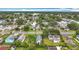 Aerial view displaying home's location in a tree-filled neighborhood and the property's well-maintained lawn at 4339 58 N Ave, St Petersburg, FL 33714