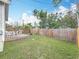 Large backyard with a wooden deck, grill and a wooden fence for privacy at 4339 58 N Ave, St Petersburg, FL 33714