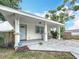 Lovely porch featuring rocking chairs, providing a relaxing outdoor space at 4339 58 N Ave, St Petersburg, FL 33714