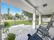 Inviting front porch area featuring comfortable rocking chairs, perfect for enjoying the outdoors at 4339 58 N Ave, St Petersburg, FL 33714