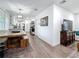 Bright hallway with hardwood floors and modern decor connecting living spaces, creating an open flow at 4339 58 N Ave, St Petersburg, FL 33714