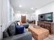 Inviting living space with a cozy sectional, and a large television for entertainment at 4339 58 N Ave, St Petersburg, FL 33714